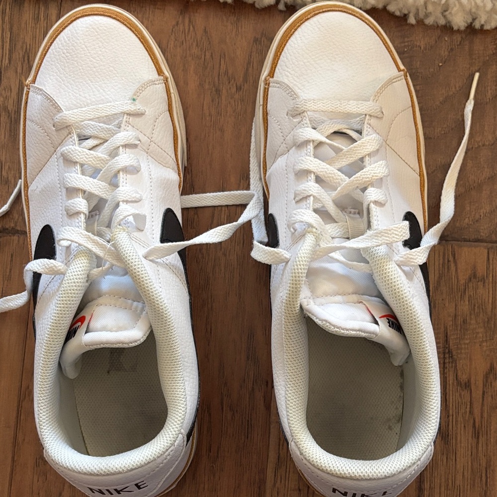 Nike White and Black Sneakers with Gold Accents